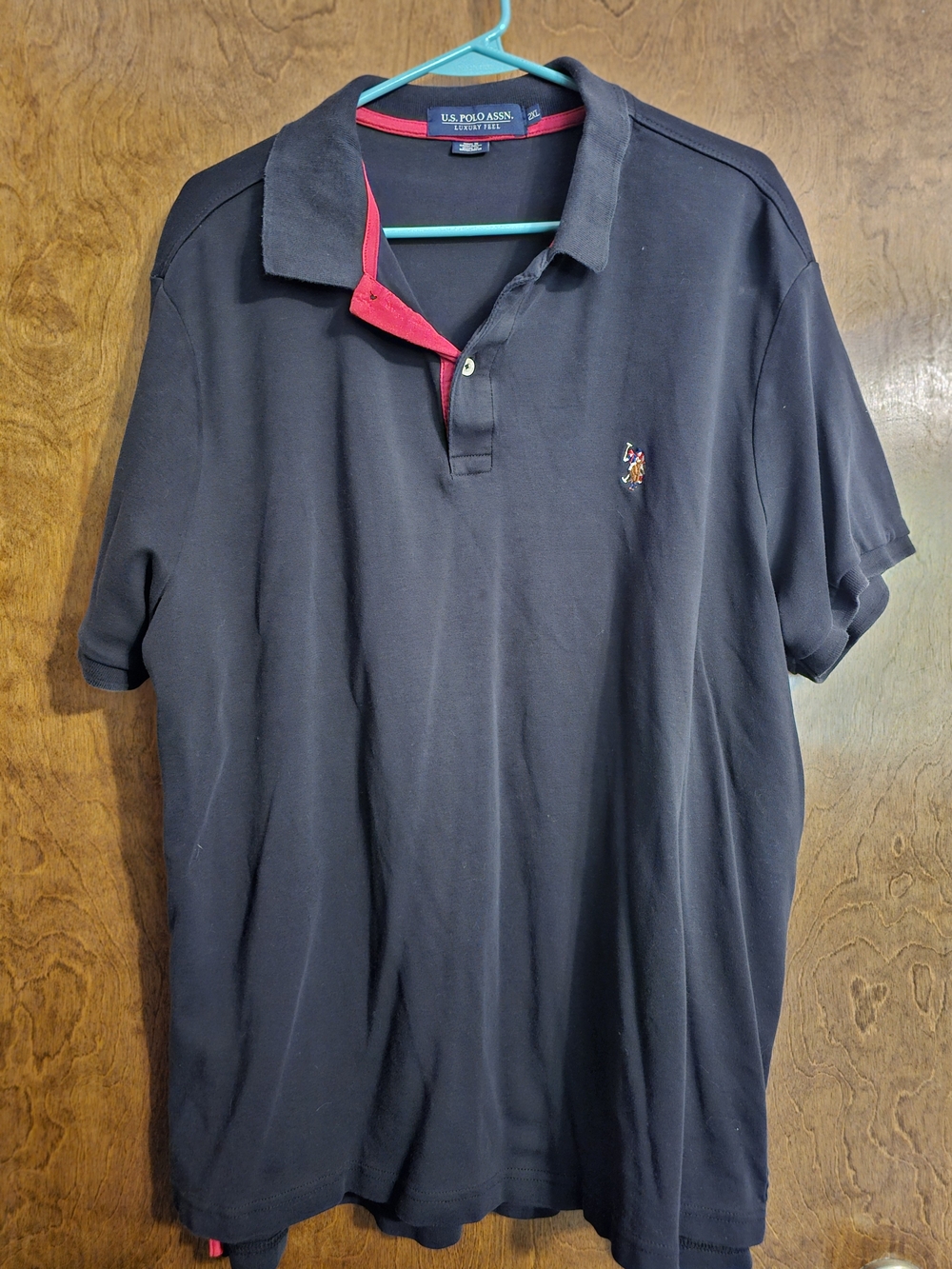 U.S. Polo Assn. Navy Polo with Red Inner Placket